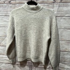 Free Press woman’s small warm cream sweater
